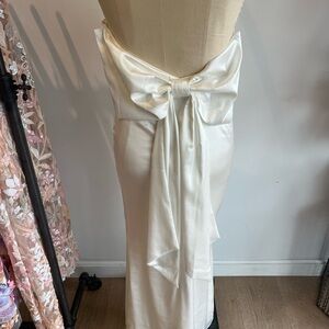 Elegant White Gown with Bow Detail